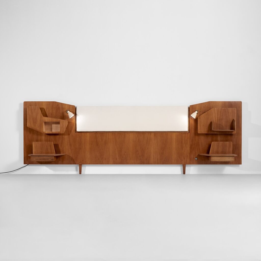 Headboard with integrated bedside tables and lights