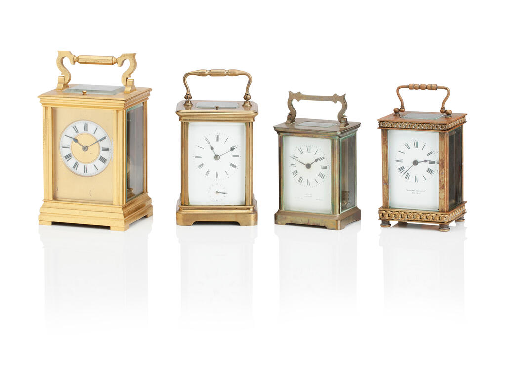 A 20TH CENTURY LACQUERED BRASS REPEATING CARRIAGE CLOCK