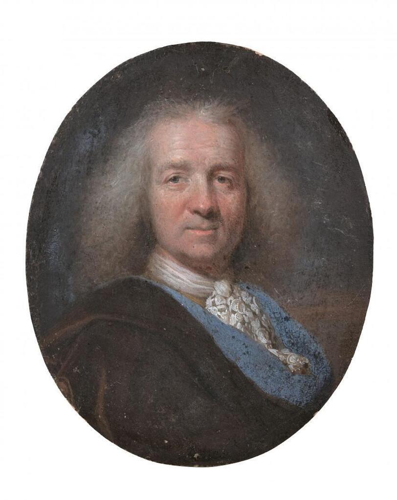 Portrait of a man with a blue scarf