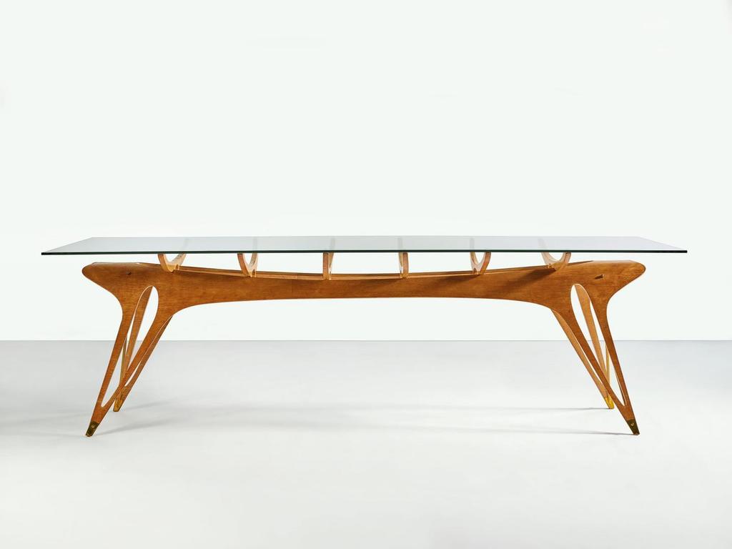 AN IMPORTANT AND UNIQUE DINING TABLE