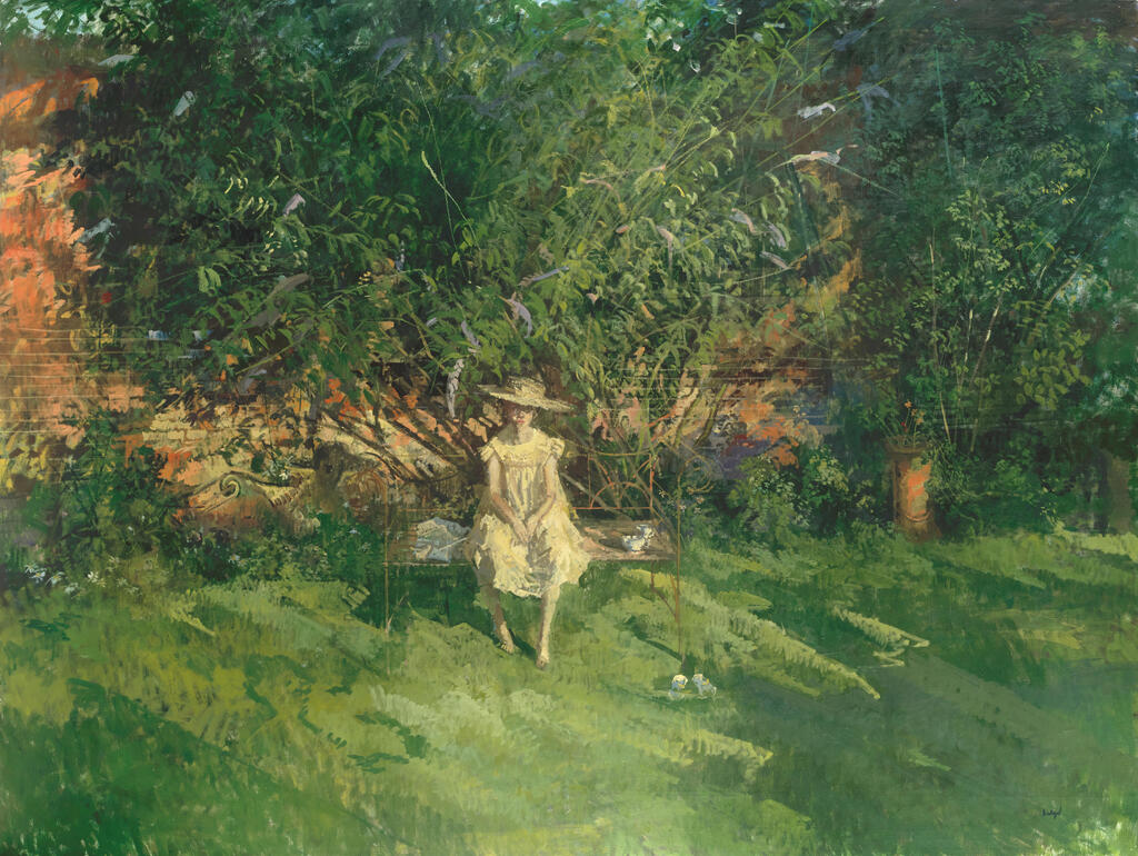 Girl seated on a garden bench