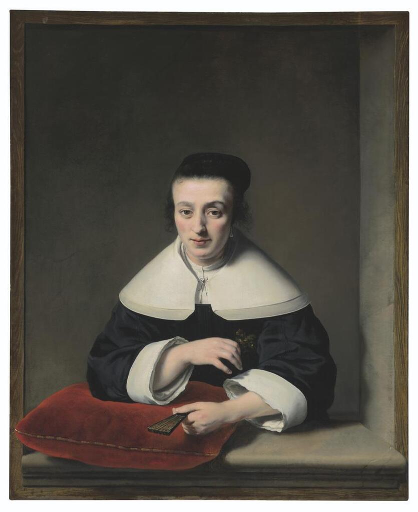 Portrait of a lady at a casement