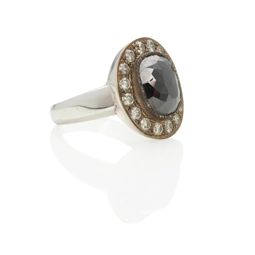 SLOANE STREET: AN 18K WHITE GOLD, BLACK DIAMOND AND DIAMOND RING