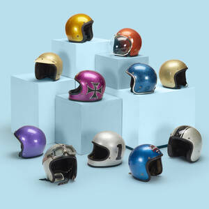 collection of eleven motorcycle helmets