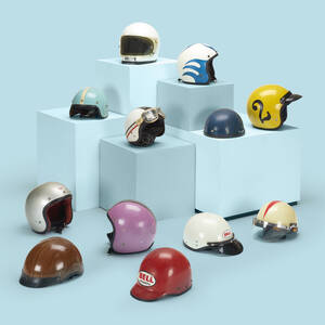 collection of twelve motorcycle helmets