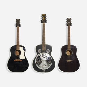 collection of three acoustic guitars
