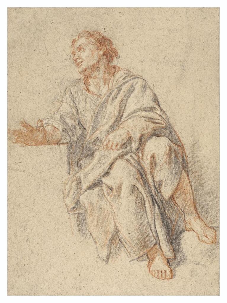 A seated man extending his right arm