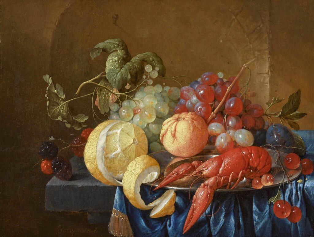 Still life with a crayfish on a pewter dish, a peeled lemon, an orange, bunches of green and black grapes and other fruit on a draped ledge