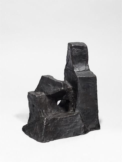 ”Kleine sitzende Figur”