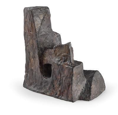 A Small Seated Figure