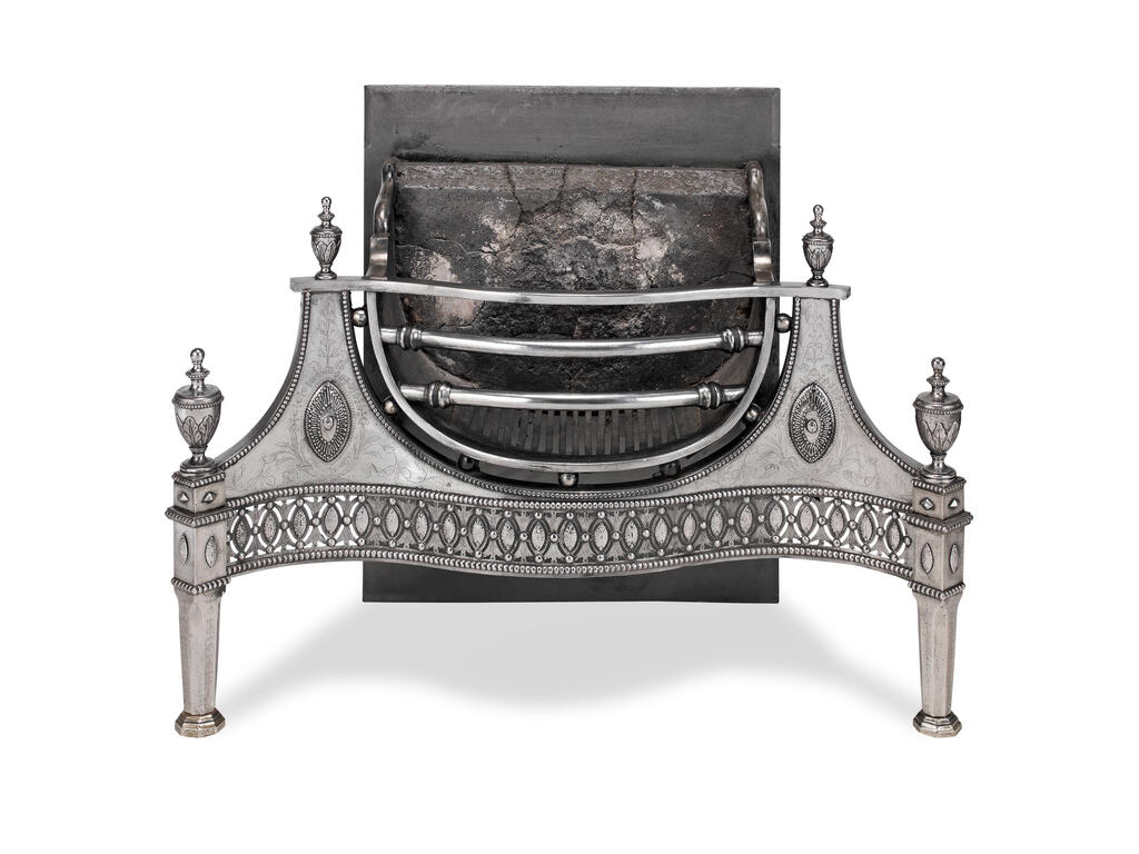 A George III polished steel and cast iron fire grate