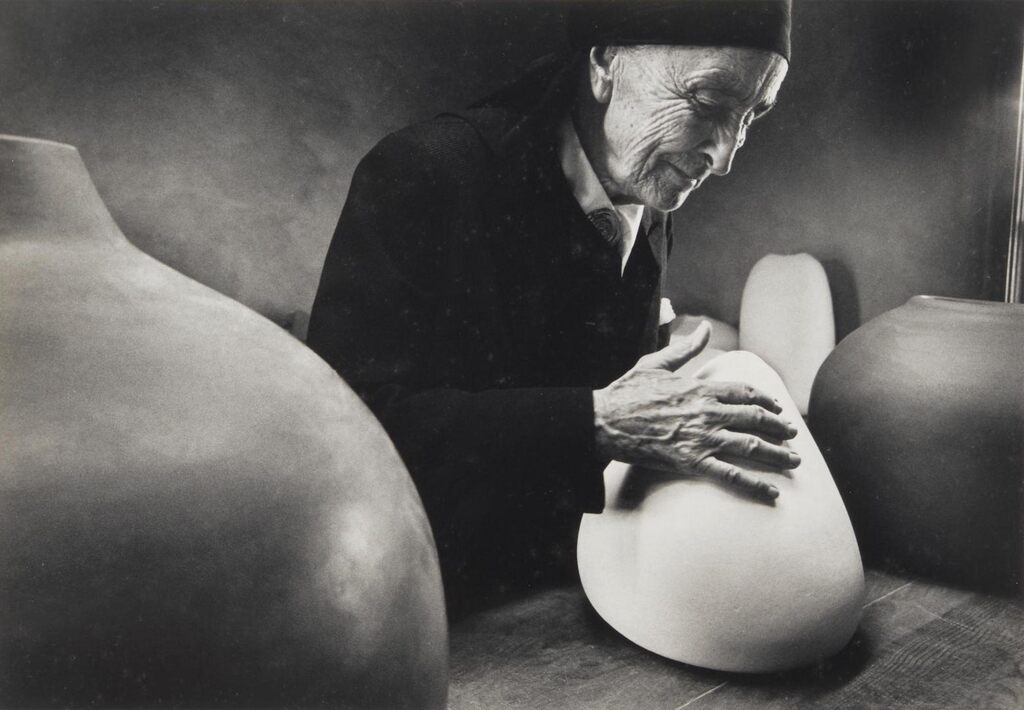 Georgia O'Keeffe at the Ghost Ranch with Pots by Juan Hamilton
