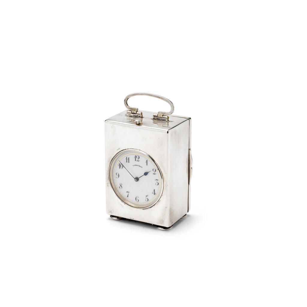 A rare early 20th century SWISS SILVER STRIKING AND MINUTE REPEATING SMALL MONTRE PENDULETTE DE VOYAGE