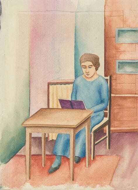 Woman reading at the table