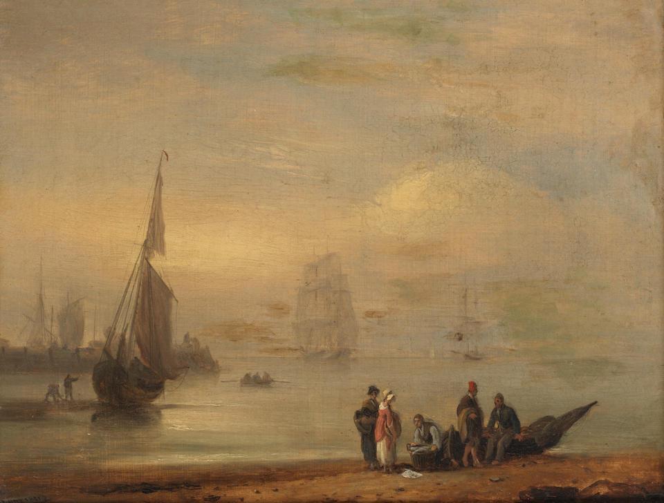 Fisherfolk with their catch on a foreshore