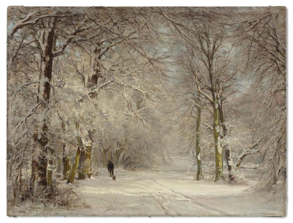 A snow covered path in winter