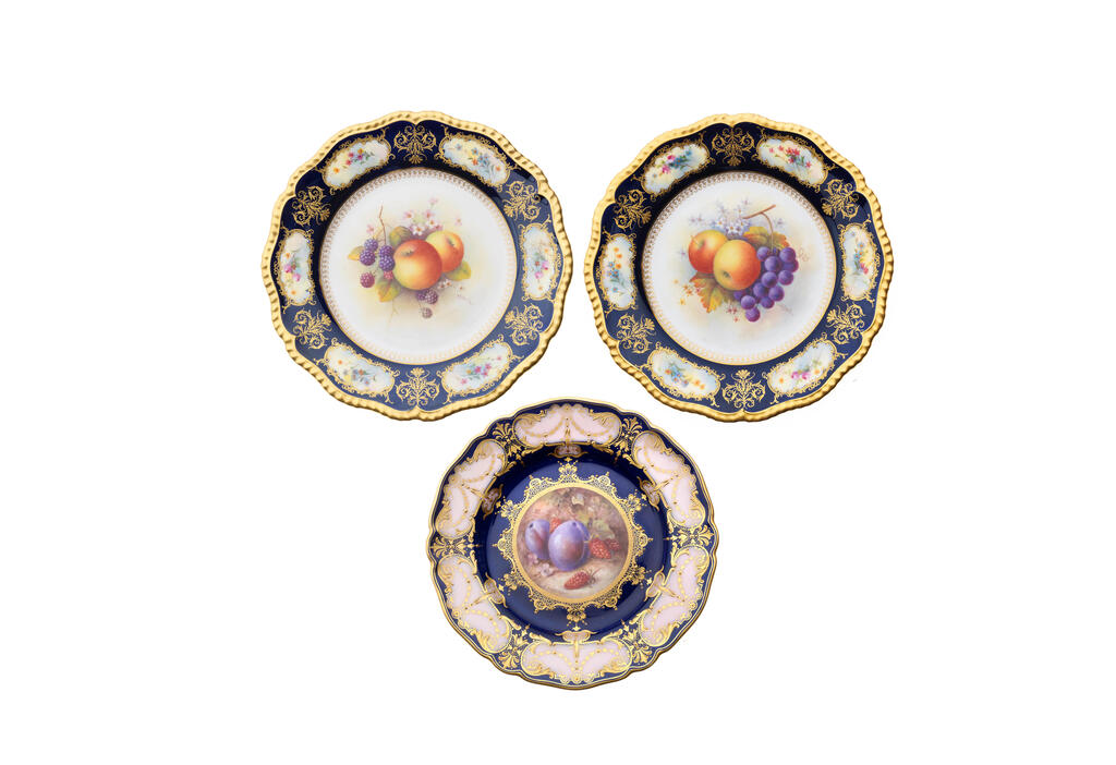 Three Royal Worcester 'Painted Fruit' plates, dated 1936 and 1917
