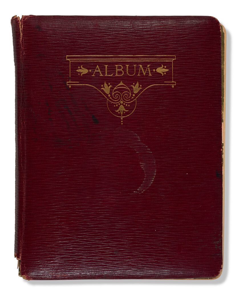 An original straight-grained morocco album, titled in gilt bound album of fifty four gilt-edge pages, containing 28 drawings and bookplate designs, some loose and some laid down onto the album pages