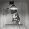 Untitled (Woman Feeding Bird), from the Kitchen Table series. 1990; printed 2022.