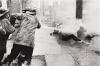 Demonstrators Lie on the Sidewalk While Firemen Hose Them, Birmingham Protests. May 1963; printed 2000s.