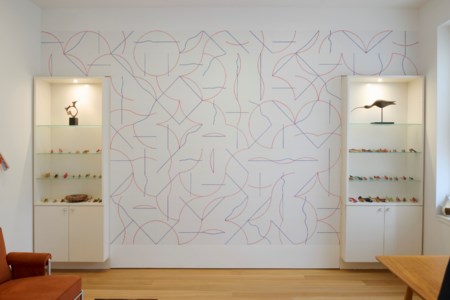 Sol LeWitt, Wall Drawing #980, A 12-inch (30 cm) grid covering the wall. Within each 12-inch (30 cm) square, one red arc from one of the four corners or four sides and one blue line (straight or not straight)