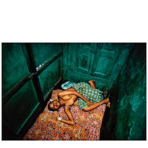 Mary Ellen Mark (1940-2015); Twelve-year-old Lata Lying in Bed, Falkland Road, Bombay, India;