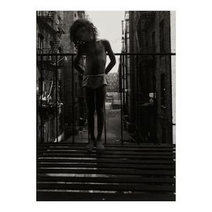 Bruce Davidson (born 1933); Child Standing on Fire Escape (from 'East 100th Street');