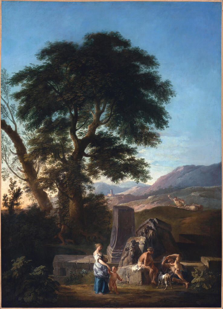 An extensive landscape with figures resting amongst ruins