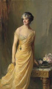 Lady Ludlow, née Alice Sedgwick Mankiewicz (previously Lady Wernher), standing, three-quarter-length, in a yellow evening dress