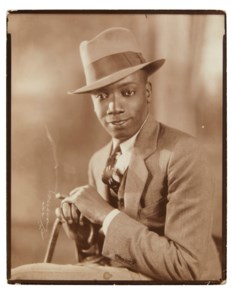 Elegant young man with cigar, 1932