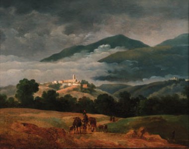 A neatherd and his cattle in a mountainous landscape