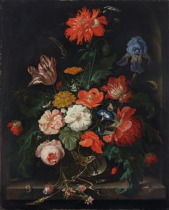 A fringed red poppy, a tulip, an iris, roses, poppies and other flowers with insects in a glass vase on a stone ledge