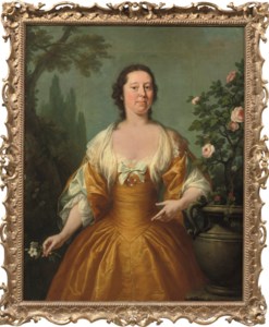 Portrait of a lady, three-quarter-length, in a yellow dress with white frills, holding a flower, in a landscape