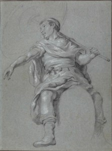 A seated African holding a parasol