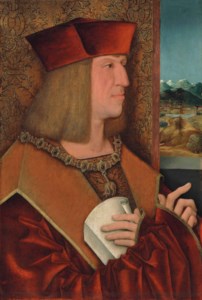 Portrait of Maximilian I, Holy Roman Emperor (1459-1519), half-length, in a red mantle, wearing the collar of the Order of the Golden Fleece, holding a letter, against a damask curtain, a mountainous landscape beyond
