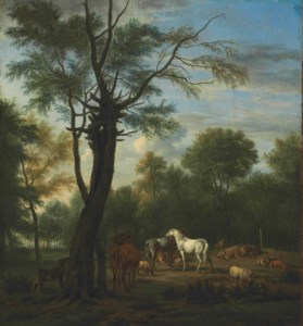 Two horses, cows, sheep and goats in a woodland clearing