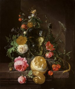 A flower garland around a berkemeier on a ledge