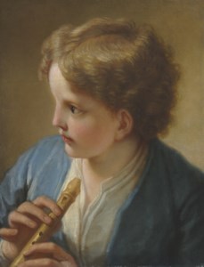 A Young boy with a flute