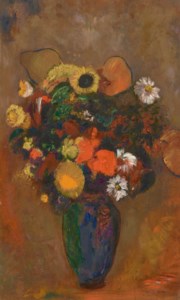 Fleurs dans un vase vert