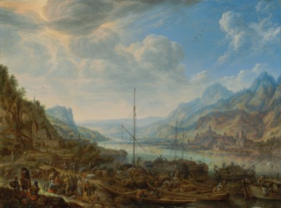 A Rhenish landscape with numerous vessels moored at a quay, a town on the opposite shore