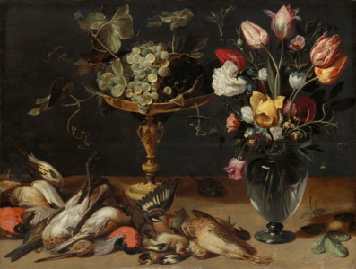 Roses, tulips and other flowers in a glass vase, a silver-gilt tazza with grapes and game birds on a table