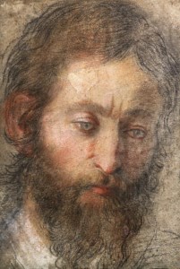The head of a man looking down