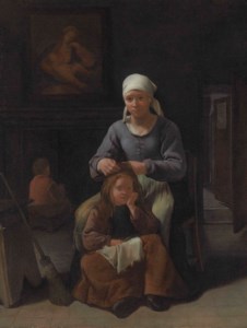 A woman grooming her child's hair