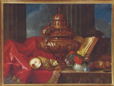 Still life with a silver vessel, flowers and shells on a table