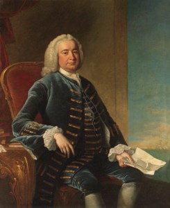 Portrait of a Naval officer, once identified as Captain Thomas Coram, three-quarter-length, seated in a blue coat and waistcoat, a document in his right hand, the sea beyond