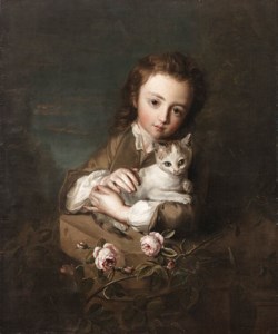 A Boy holding a Kitten in a Landscape