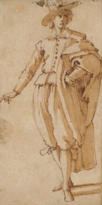 An elegantly dressed young man wearing a hat