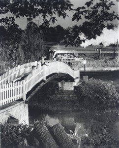The Keith children fishing as train no. 2 passes, 1956