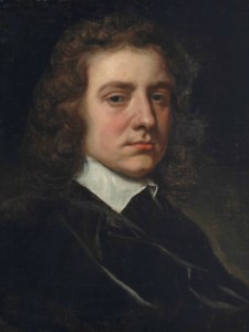 Portrait of a gentleman, half-length, in a black coat and white collar