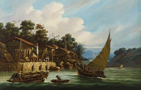 Tanka boats and ferry off a quayside